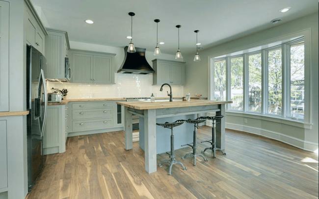 sage kitchen with butcher block countertops