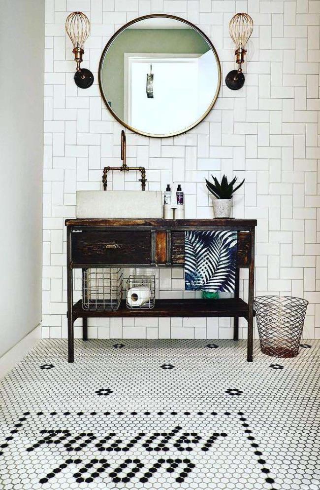 Bathroom with tile that says powder room