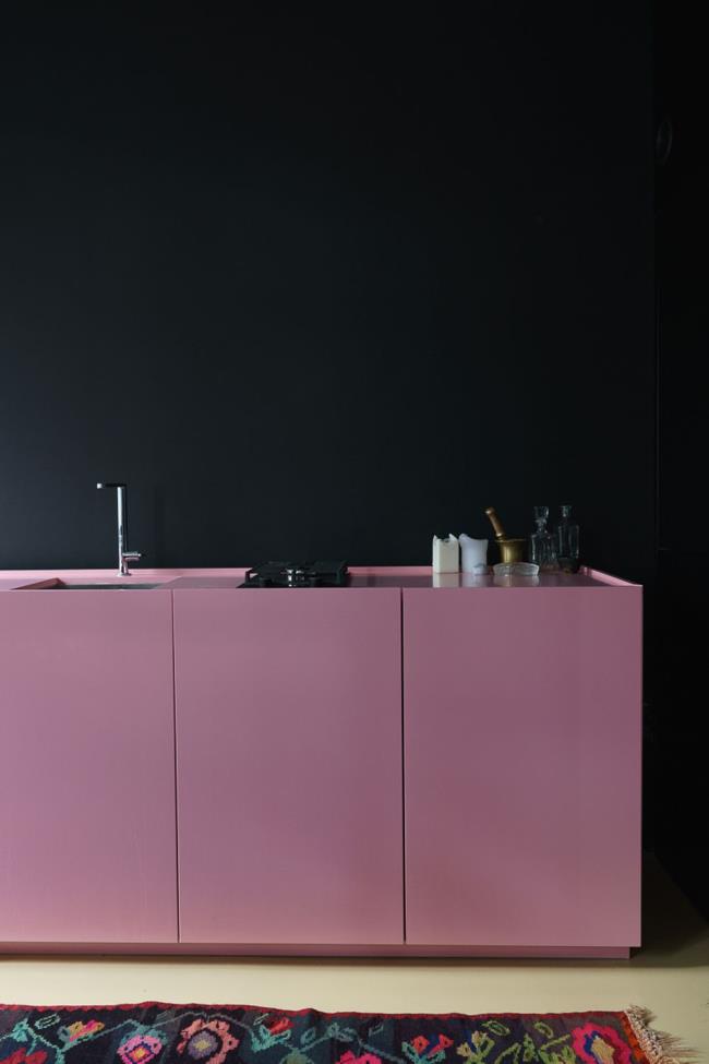 Pink and black kitchen