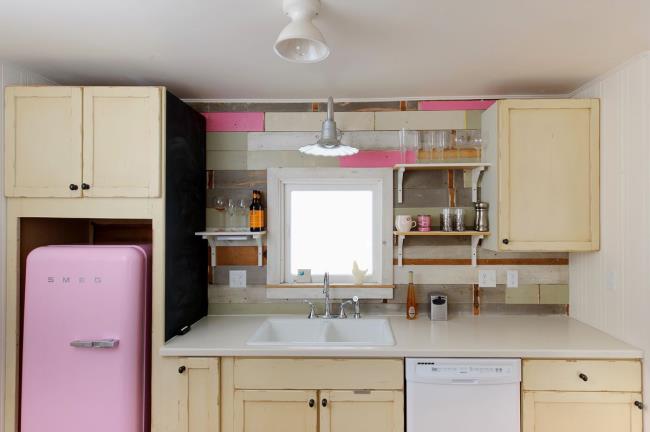 retro kitchen with pink fridge