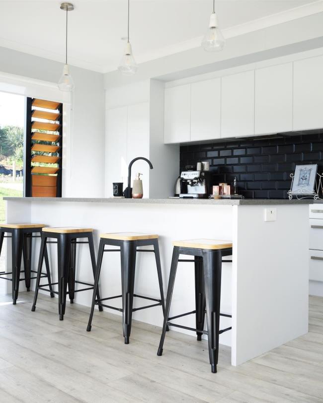 Black subway tile kitchen backsplash