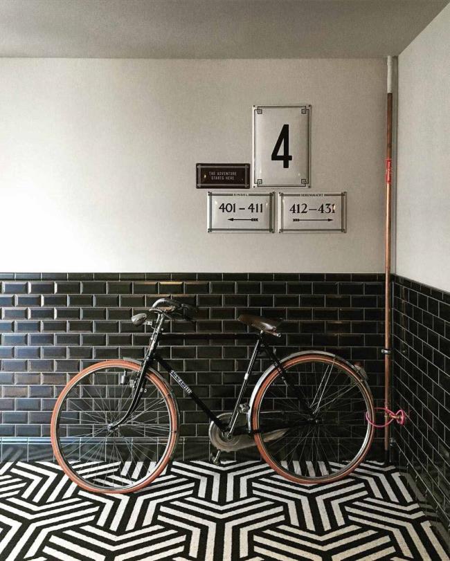 Black subway tile entranceway