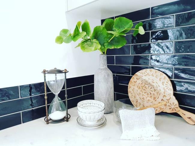 Black subway tile in kitchen