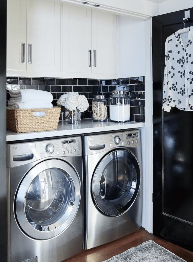 Black subway tile in laundry room