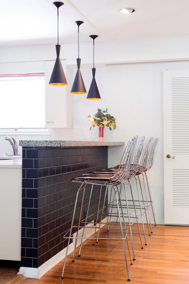 Black subway tile bar island