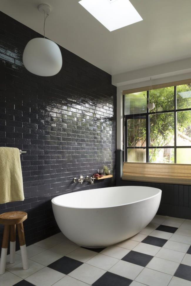 Subway tile wall in bathroom