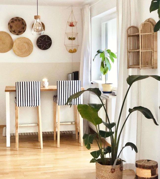 Boho style breakfast bar with baskets on the wall