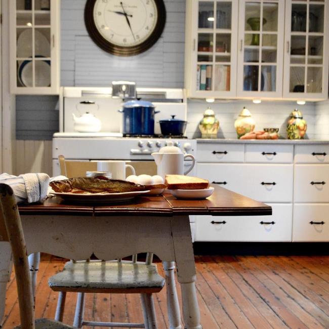 Antique kitchen with a table in it