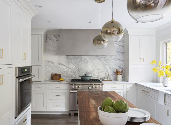 white kitchen cabinets and marble