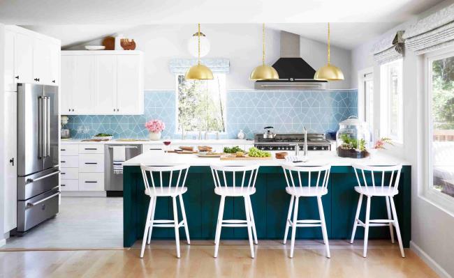 white cabinets with patterned backsplash