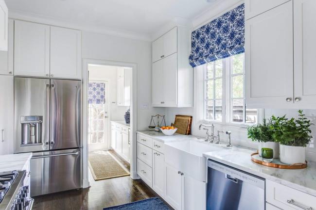 white cabinets in galley style kitchen