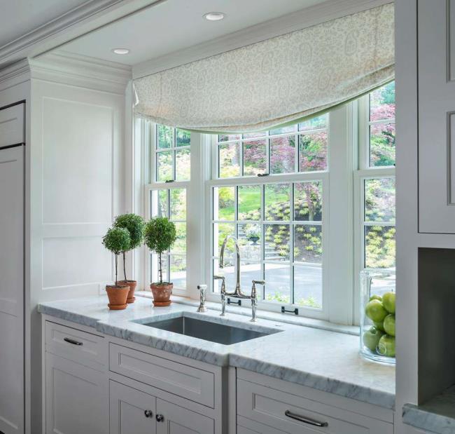 Topiaries in white kitchen