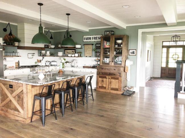 large kitchen with large island and wooden accents