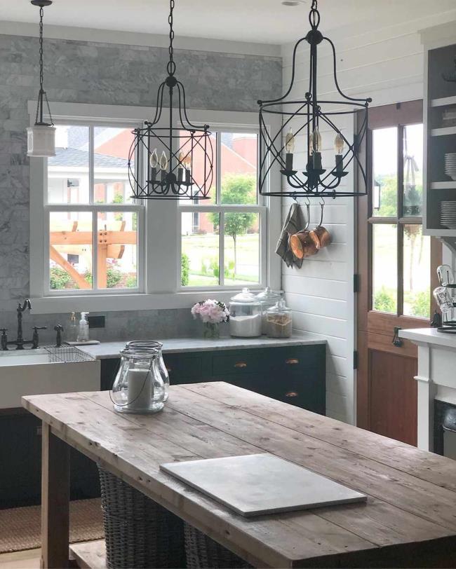 Kitchen with a rustic table as an island