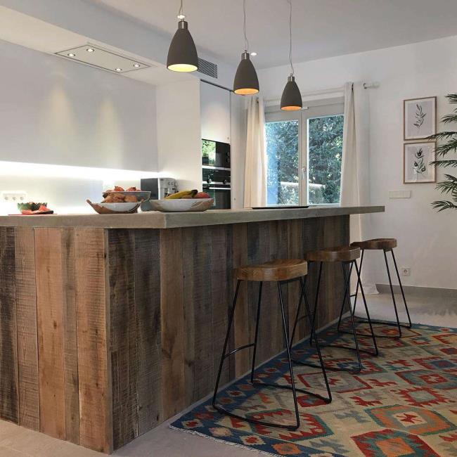 Kitchen with a large wooden island