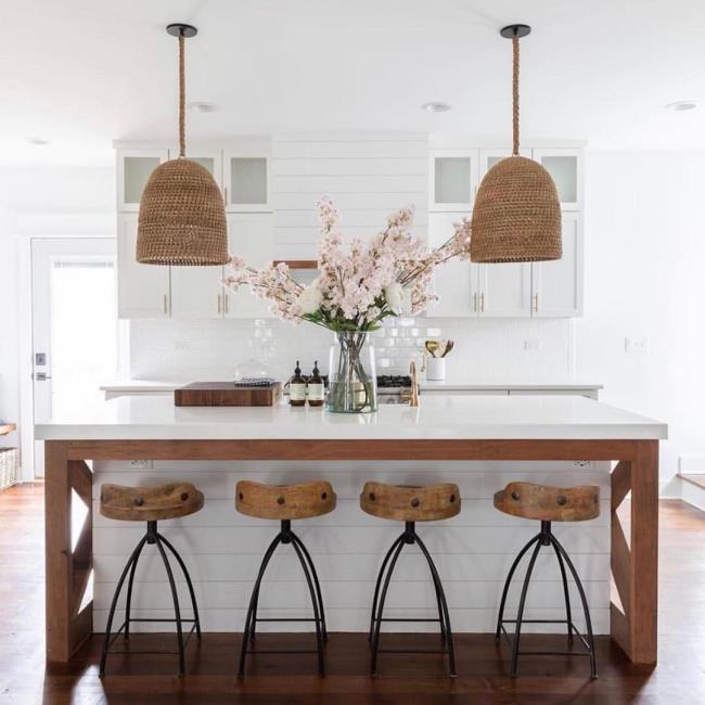 Kitchen with a large white and wooden island