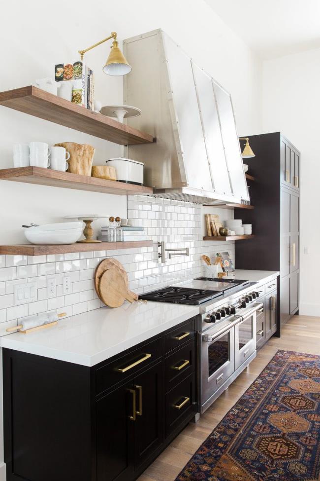 black kitchen with subway tile