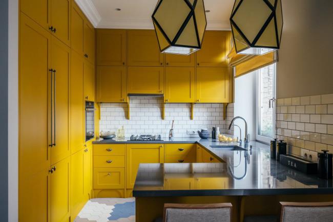 modern yellow kitchen white backsplash