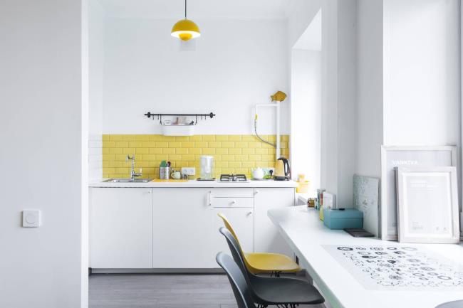 yellow subway tile backsplash in kitchen