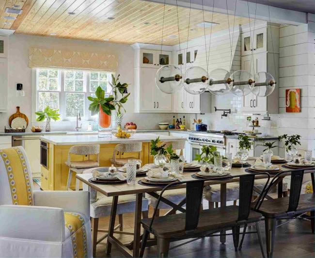 yellow kitchen island in white kitchen