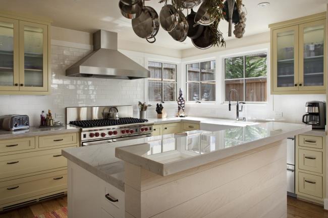 pale yellow cabinetry in kitchen