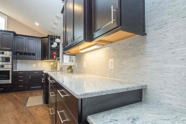 Granite countertop with marble backsplash