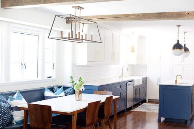 blue and white kitchen with wood floors