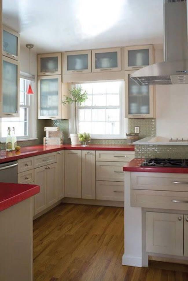 white kitchen with bright red countertops