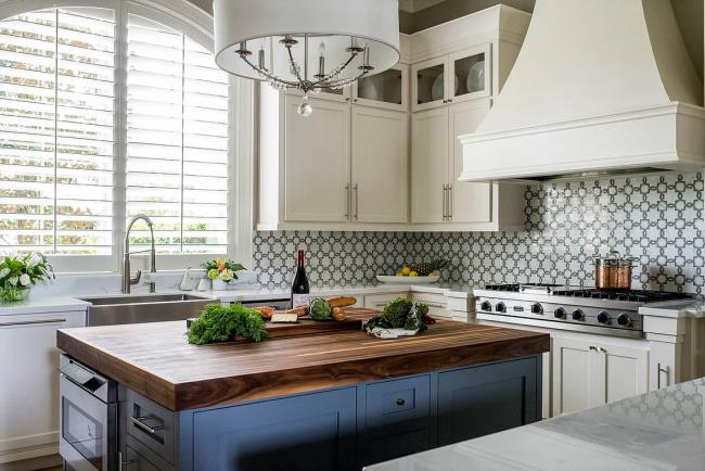 butcher block countertop blue cabinets