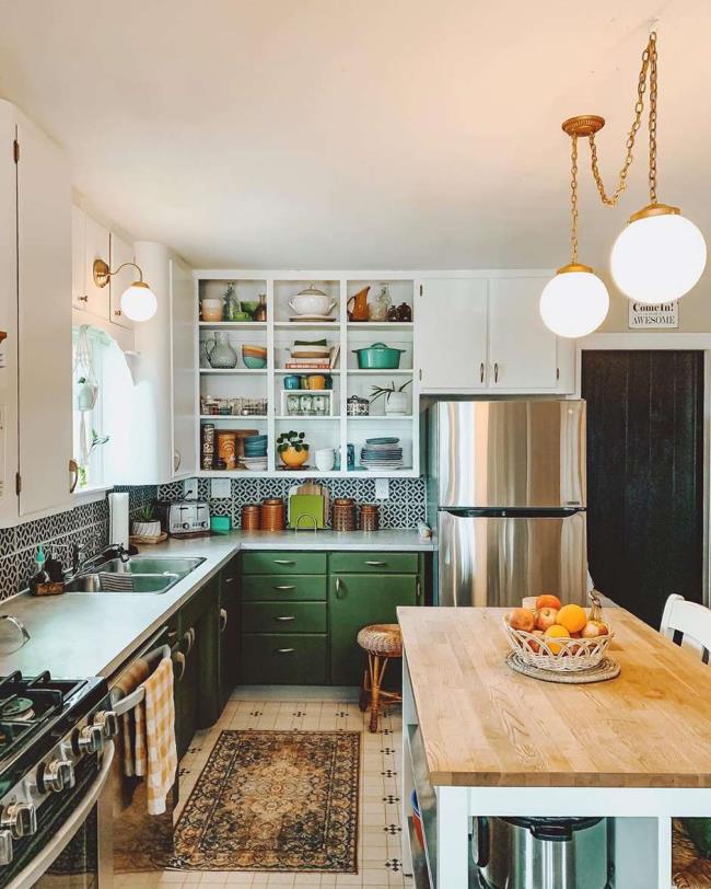 Kitchen with hunter green cabinets