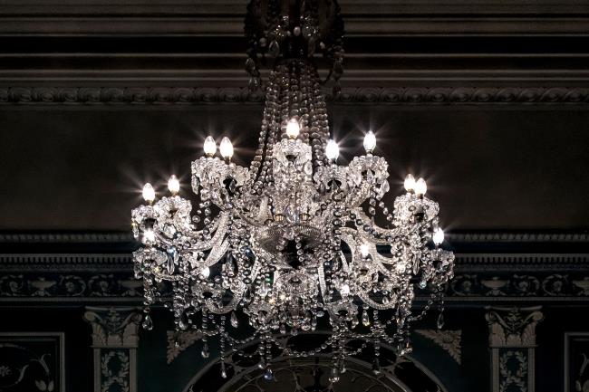 A crystal chandelier adds light, sophistication, and ambiance to any space