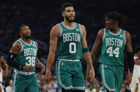 NEW YORK, NEW YORK - OCTOBER 20: Marcus Smart #36, Jayson Tatum #0, and Robert Williams III #44 of the Boston Celtics look on during the first half against the New York Knicks at Madison Square Garden on October 20, 2021 in New York City. NOTE TO USER: User expressly acknowledges and agrees that, by downloading and or using this photograph, User is co<em></em>nsenting to the terms and co<em></em>nditions of the Getty Images License Agreement. (Photo by Sarah Stier/Getty Images)