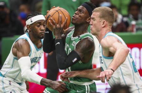 BOSTON, MA - JANUARY 19: Dennis Schroder #71 of the Boston Celtics drives to the basket during a game against the Charlotte Hornets at TD Garden on January 19, 2022 in Boston, Massachusetts. NOTE TO USER: User expressly acknowledges and agrees that, by downloading and or using this photograph, User is co<em></em>nsenting to the terms and co<em></em>nditions of the Getty Images License Agreement. (Photo by Adam Glanzman/Getty Images)